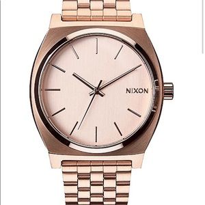 Nixon rose gold time teller watch